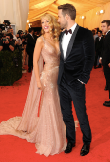 With husband Ryan Reynolds and the 2014 Met Gala.
